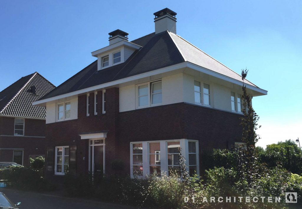 nieuwbouw villa jaren 30 met leien en wit gestucte accenten Leusden